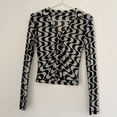 Haut manches longues motif ondulé noir et blanc