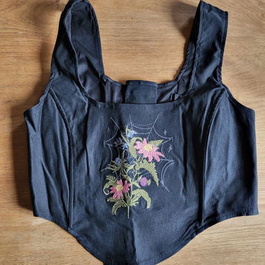 Top corsetto nero con ricami