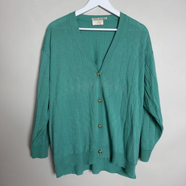 Türkisfarbene Strickjacke