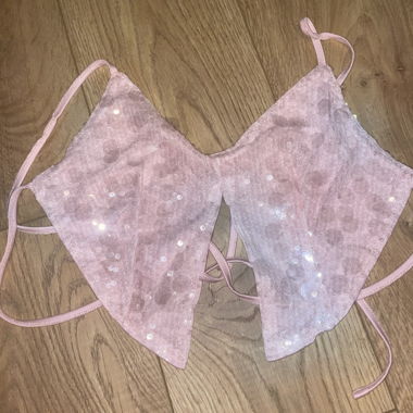Top rosa scintillante
