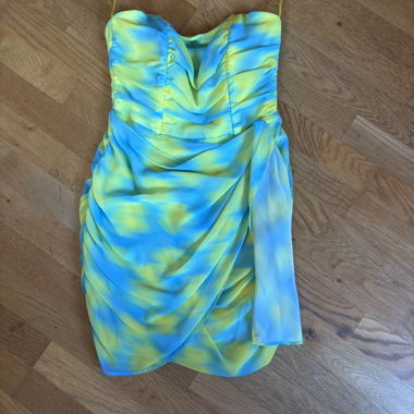 Short blue and yellow bustier dress