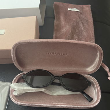 Miu Miu OMU 04ZS