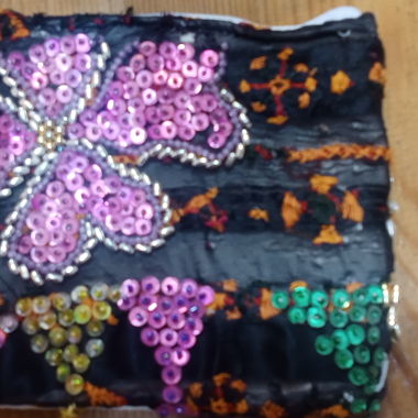 Piccola pochette in tessuto ricamata/astuccio per cosmetici
