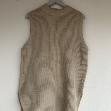 Long sleeveless sweater