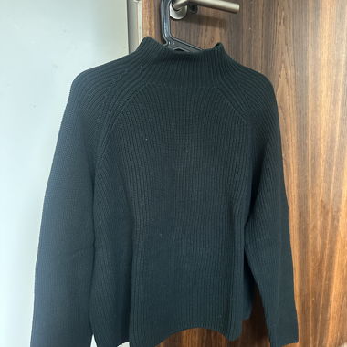 Dark green knitted sweater