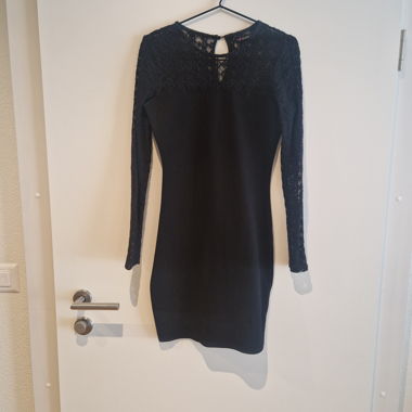 Abito elegante in pizzo nero