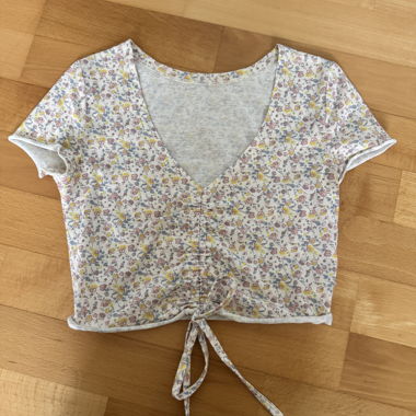 Top crop floreale con laccetto davanti xs-s