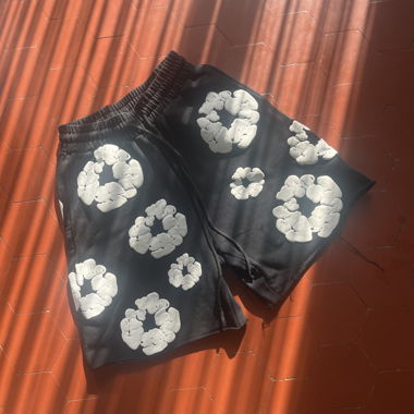 Denim Tears Shorts con stampa floreale bianca