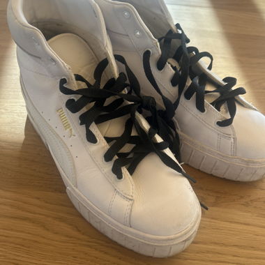 Puma white high-top sneakers