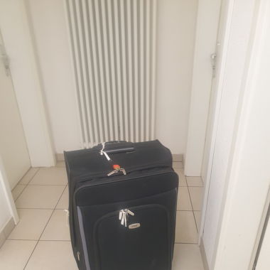 Valigia con impugnatura da trasporto 
