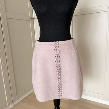Jupe courte rose à cordage