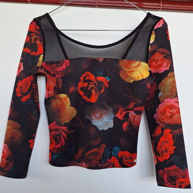 Top maniche lunghe con motivo floreale