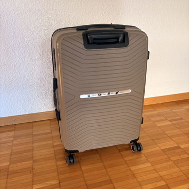 Valise à coque rigide avec roulettes