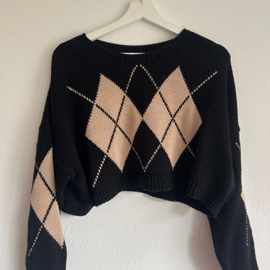 Pullover corto