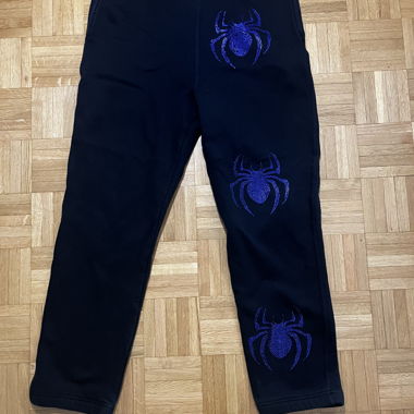 Pantaloni da jogging neri con ragno