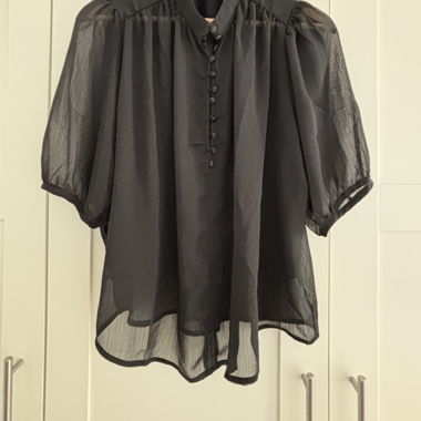 Camicia nera trasparente