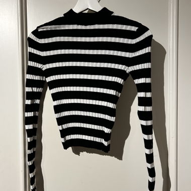Maglione a collo alto a righe