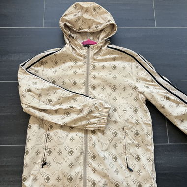 Veste coupe-vent beige à capuche