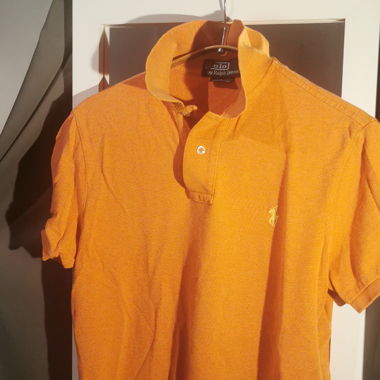 Orange Polo Ralph Lauren until June 2025