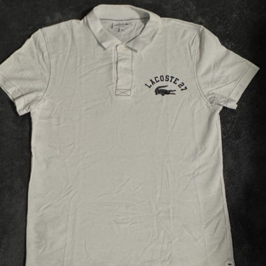 Polo Lacoste bianco