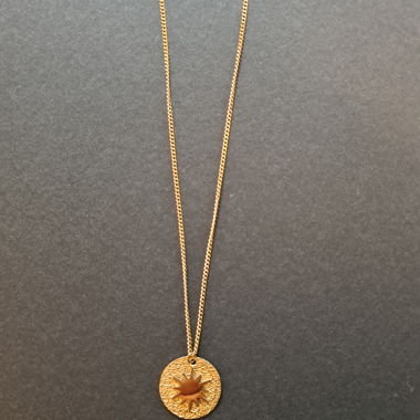 Collana zag con ciondolo sole dorato