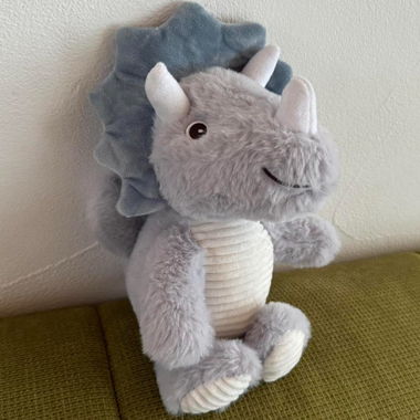 grey and blue dinosaur stuffed animal