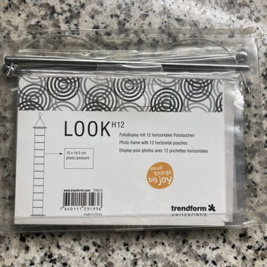 Photo display with 12 horizontal photo pockets