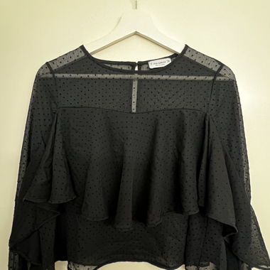 Blusa nera trasparente