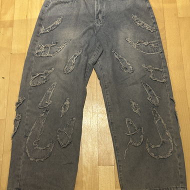 Jeans baggy viola strappati