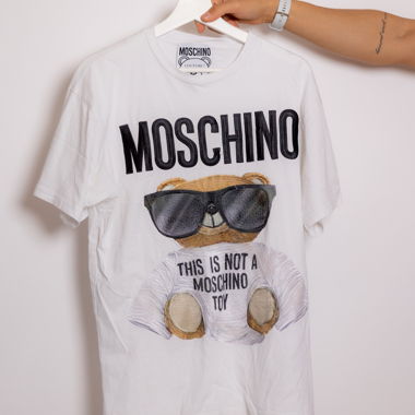 Moschino embroidered shirt with red outfit
