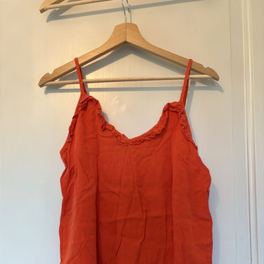 Top orange a volant