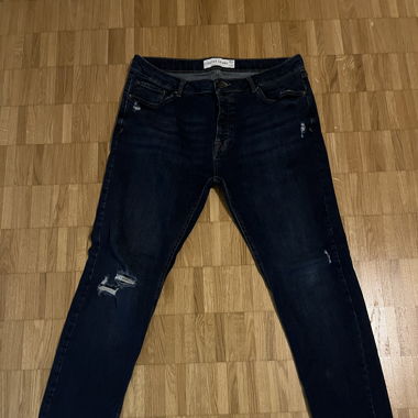 Dunkelblaue Herren Jeans Grösse 38/34 mit Rissen 