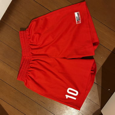 Pantaloncini sportivi rossi Gr. 140