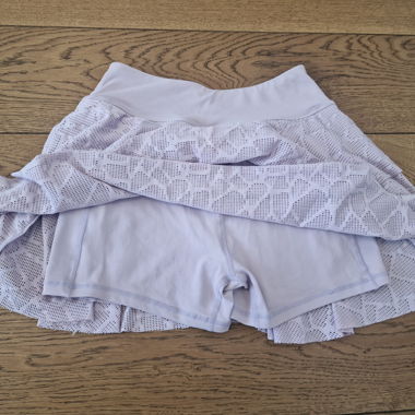 Jupe sport à volants rose Gr. S comme neuve