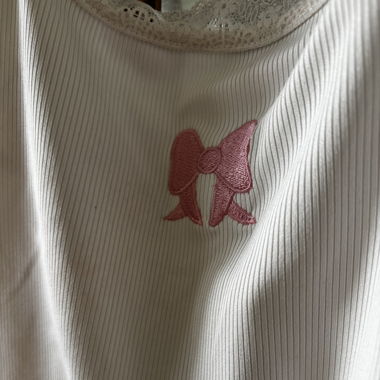 backless white tank top with pink bow print