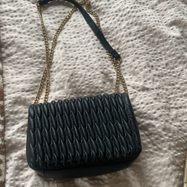 Black shoulder bag with chain strap