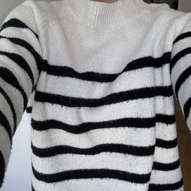 Pull col roulé à rayures