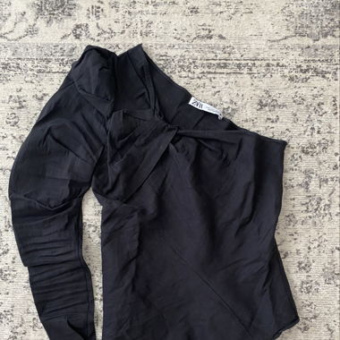 Haut asymétrique, S