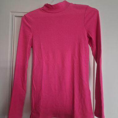 Maglia a collo alto a coste rosa stile anni '90