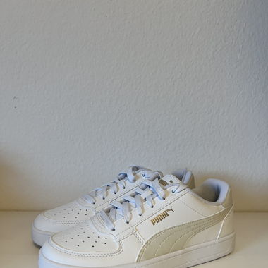 Puma Sneakers mit gold beige details 