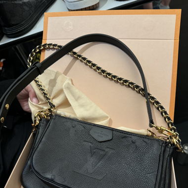 Multipochette Louis Vuitton Leder
