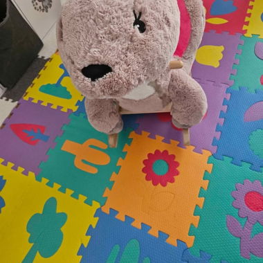 Cavallo a dondolo in peluche
