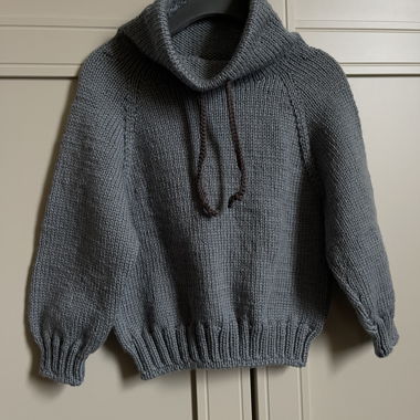 Maglione per bambini lavorato a mano in 100% lana merino