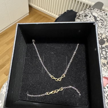 Parure collana e bracciale a catena in argento