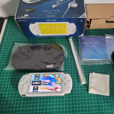 PSP with Games Installed [in box/OVP]
