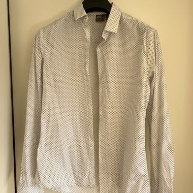 Chemise blanche à pois