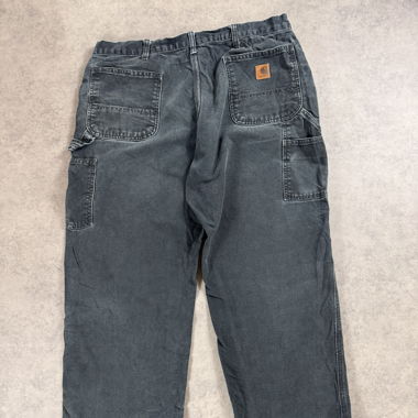 Faded black carhartt pant