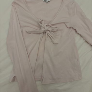 Haut rose poudré à manches longues avec lien