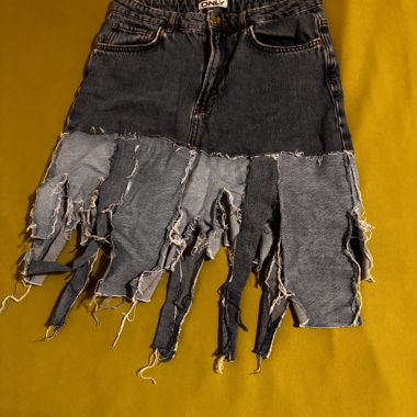 Denim fringe mini skirt