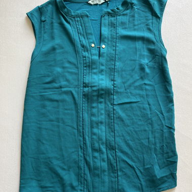 Blusa senza maniche turchese